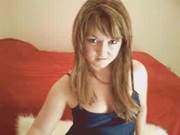 Busty British babe sucking huge dildo