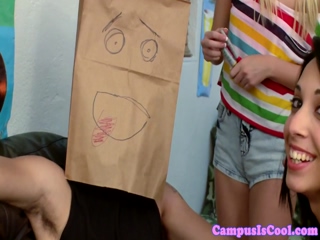 Tugging college teens play a game in the dorm