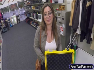 Sexy babe with glasses sells her watches