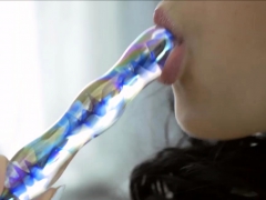 Nora Takes Care Of Herself With A Glass Dildo