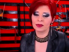 Seductive Red Head Dom Milf Smoking On Cam In Boots