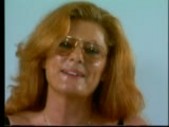 Mature redhead poses for pictures