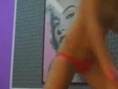 Busty brunette with curvy body gives a hot show