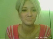 Blonde shows nice round tits and ass 
