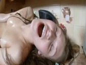Brunette masturbation in the kitchen