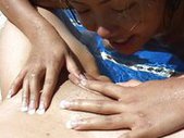Two Asian girls having fun at the pool