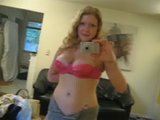 Busty girl next door Andy Lynn takes picture of herself in the mi