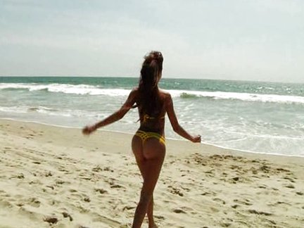 Lela Star in swimsuit and Manuel Ferrara